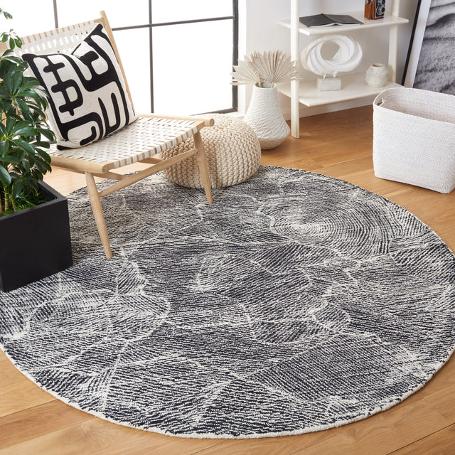 Safavieh Metro Met999Z Black/Ivory Rugs.