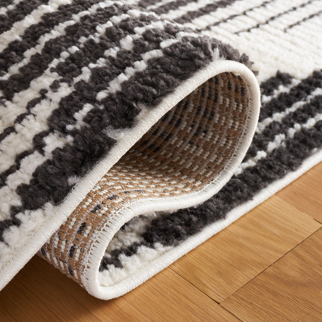 Safavieh Moroccan Tassel Mrt101A Ivory/Black Rug.