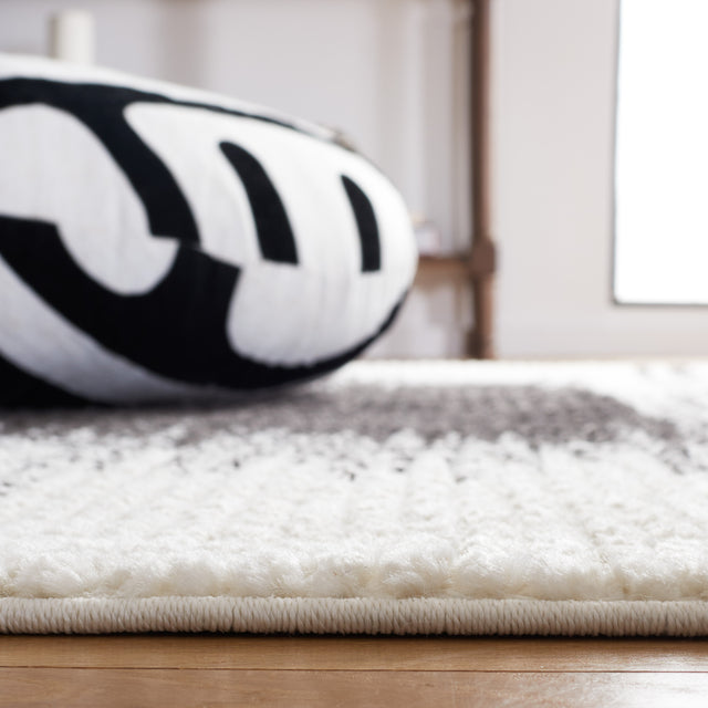 Safavieh Moroccan Tassel Mrt107A Ivory/Black Rug.