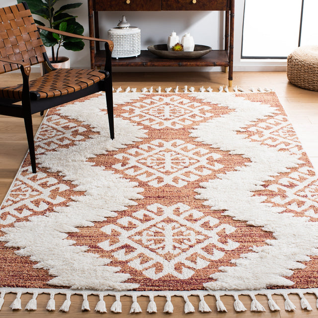 Safavieh Moroccan Tassel Shag Mts652P Orange/Ivory Rug.