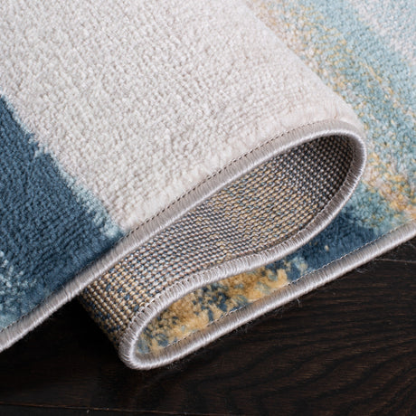 Safavieh Skyler Sky542B Beige/Navy Rugs.