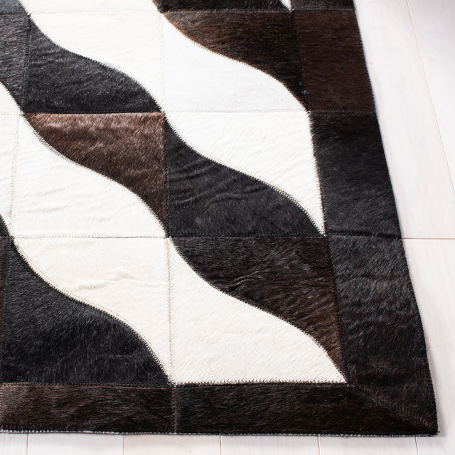 Safavieh Studio Leather Stl801Z Black/Ivory Rugs.
