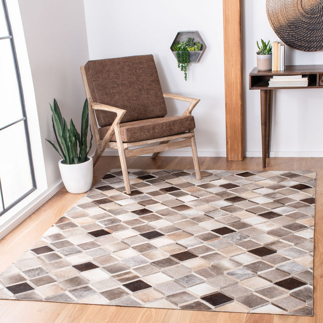 Safavieh Studio Leather Stl807A Ivory/Grey Rugs.