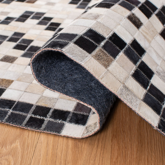 Safavieh Studio Leather Stl811A Ivory/Black Rugs.