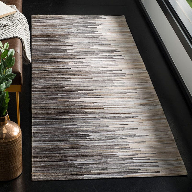 Safavieh Studio Leather Stl225H Charcoal / Ivory Rugs.