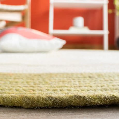 Safavieh Braided 5'-0" x 7'-0" Rug in Green / Ivory