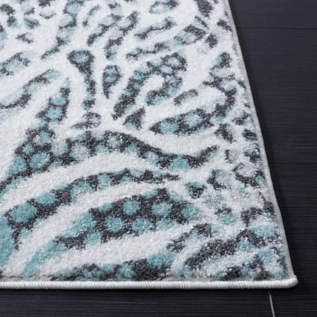 Safavieh Amsterdam 4'-0" x 6'-0" Rug in Ivory / Teal