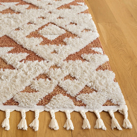 Safavieh Moroccan Tassel Shag 4'-0" x 6'-0" Rug in Ivory / Brick Rust