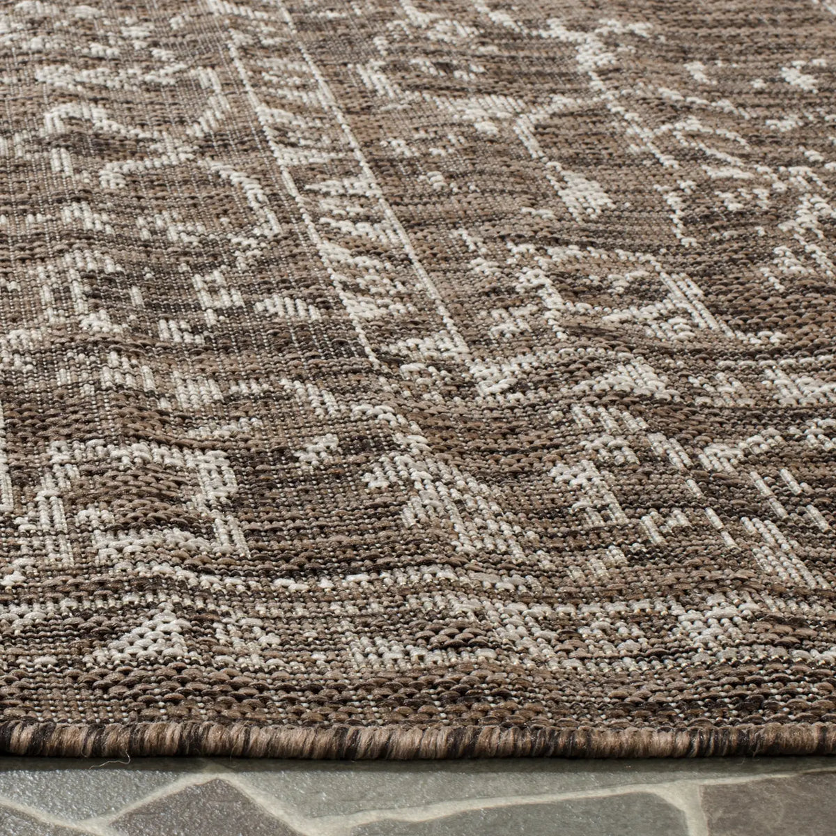 Safavieh Courtyard 5'-3" x 7'-7" Rug in Brown / Beige