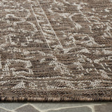 Safavieh Courtyard 5'-3" x 7'-7" Rug in Brown / Beige