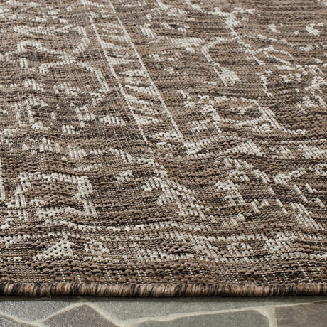 Safavieh Courtyard 5'-3" x 7'-7" Rug in Brown / Beige
