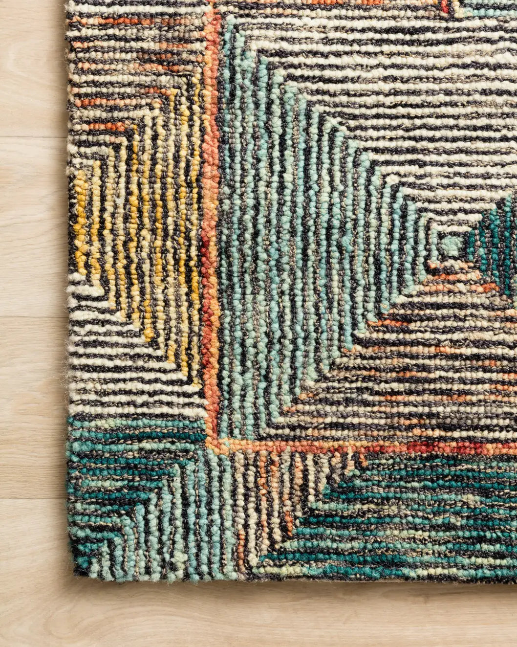 Loloi Spectrum Spe-01 Lagoon/Spice Rugs - corner on wood