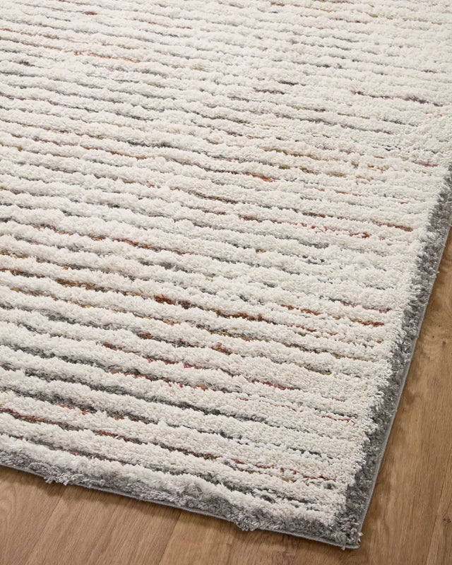 Loloi Levitt Shag Lev-01 Ivory/Multi Rug - angled corner on wood