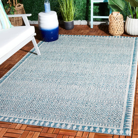 Safavieh Courtyard 5'-3" x 7'-7" Rug in Blue / Grey