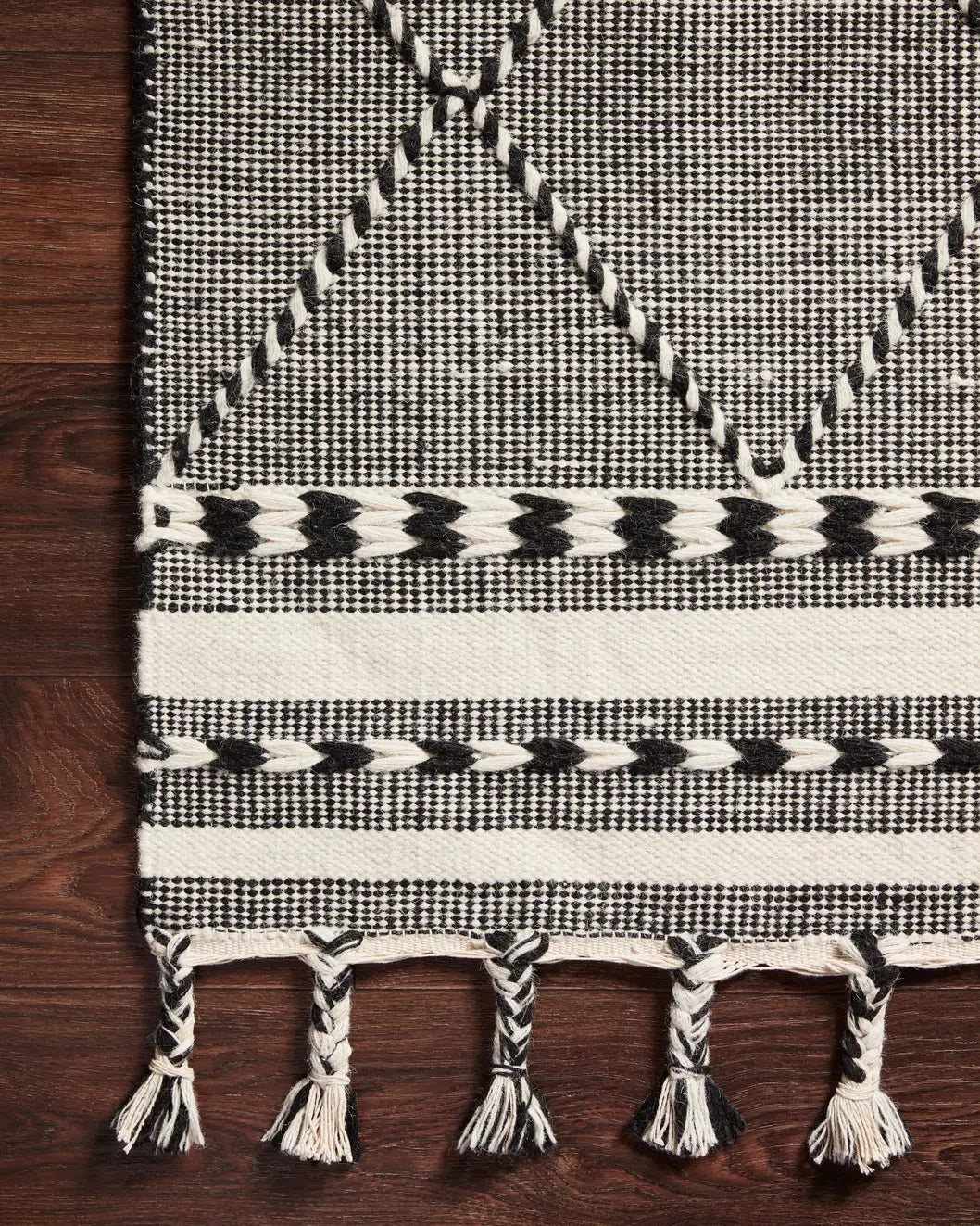 Loloi Sawyer Saw-01 Black Rugs - corner on wood
