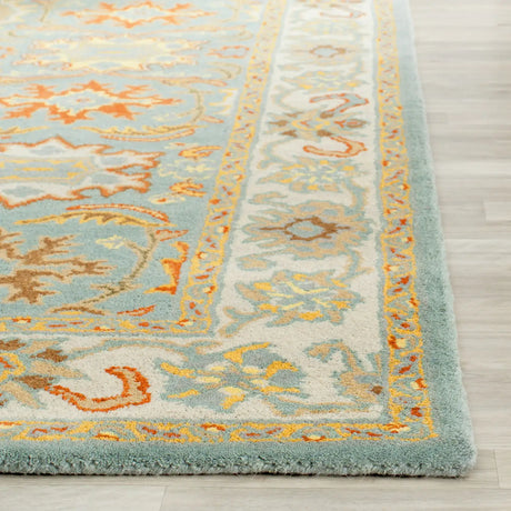 Safavieh Heritage 9'-6" x 13'-6" Rug in Light Blue / Ivory