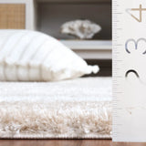 Safavieh Tahoe Shag 4'-0" x 6'-0" Rug in Gold / Ivory