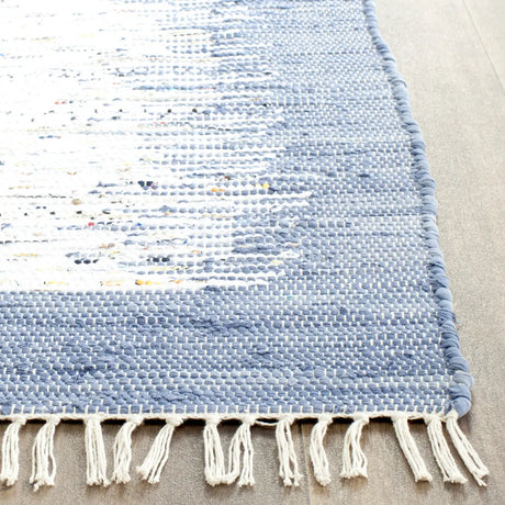 Safavieh Montauk 2'-3" x 6'-0" Rug in Ivory / Dark Blue