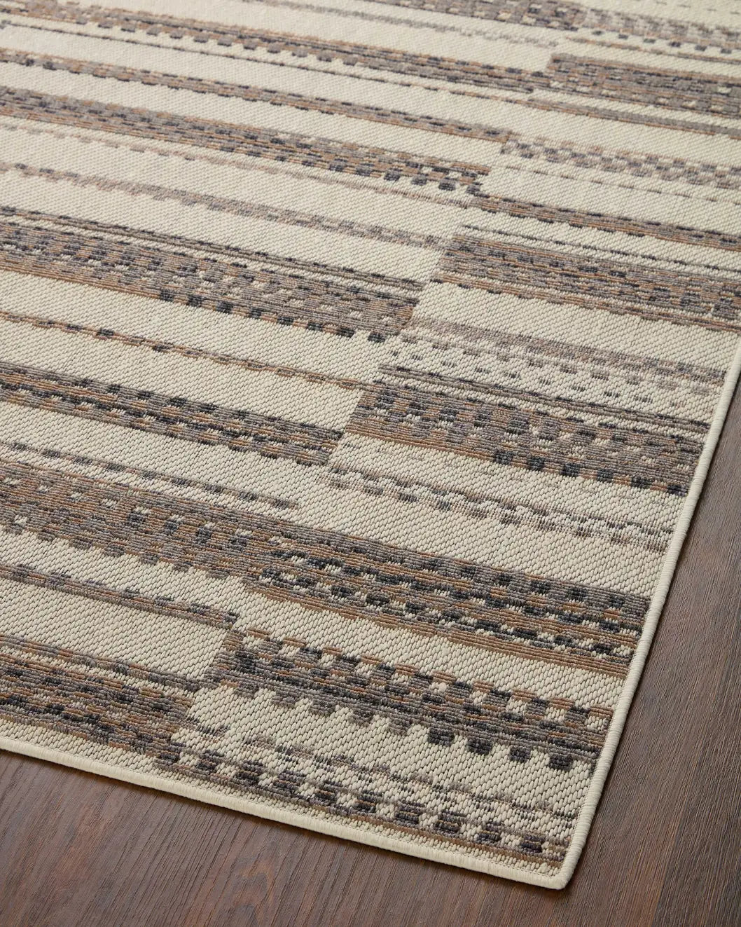 Loloi Rainier Rai-08 Ivory/Taupe Rug - angled corner on wood