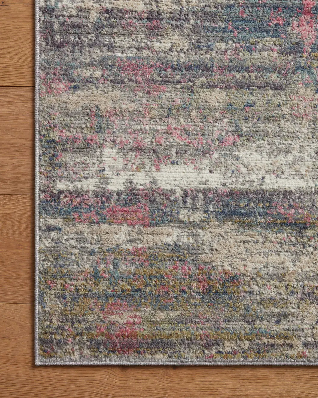 Loloi Arden Ard-05 Berry/Multi Rug - corner on wood