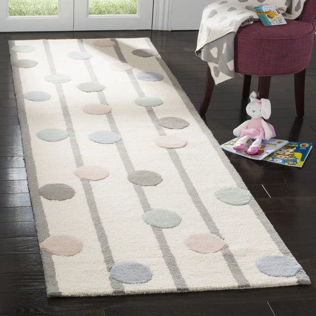 Safavieh Safavieh Kids 2'-6" x 10'-0" Rug in Ivory / Multi