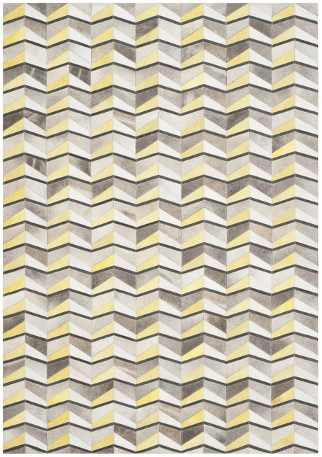 Safavieh Studio Leather 4'-0" x 6'-0" Rug in Ivory / Yellow