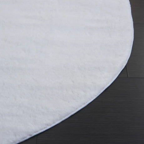 Safavieh Faux Rabbit Fur 5'-0" x 7'-0" Rug in Ivory