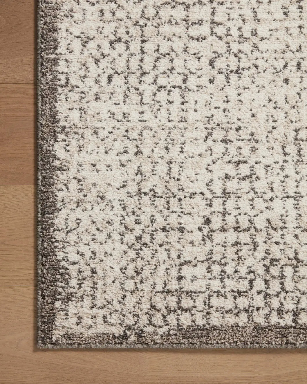 Loloi Darby Dar-04 Ivory/Stone Rug - corner on wood