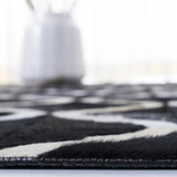 Safavieh Studio Leather 4'-0" x 6'-0" Rug in Black / Beige
