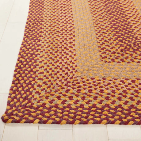 Safavieh Braided 4'-0" x 6'-0" Rug in Yellow / Red