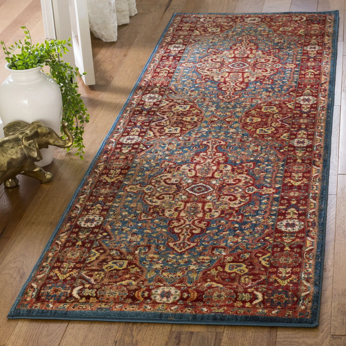 Safavieh Kashan 2'-6" x 10'-0" Rug in Blue / Red