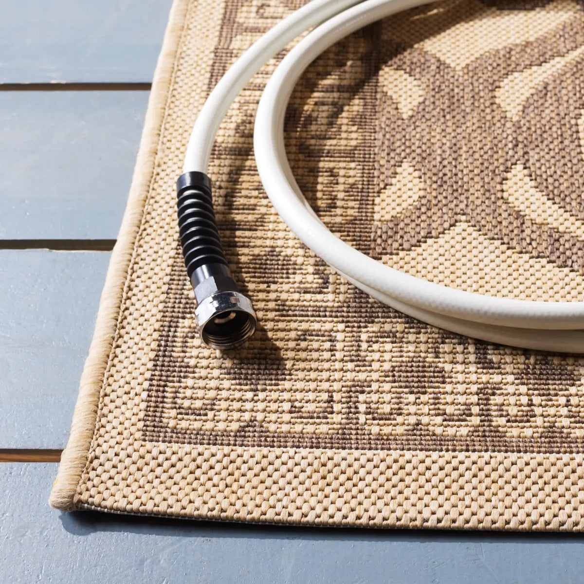 Safavieh Courtyard 5'-3" x 7'-7" Rug in Natural / Brown
