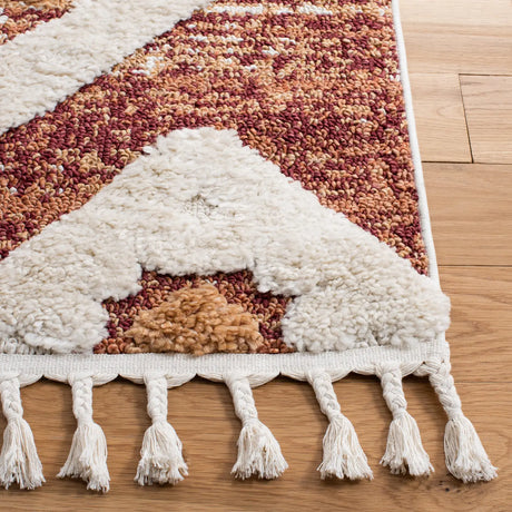 Safavieh Moroccan Tassel Shag 4'-0" x 6'-0" Rug in Rust / Ivory