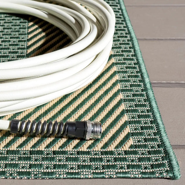 Safavieh Courtyard 5'-3" x 7'-7" Rug in Green / Beige