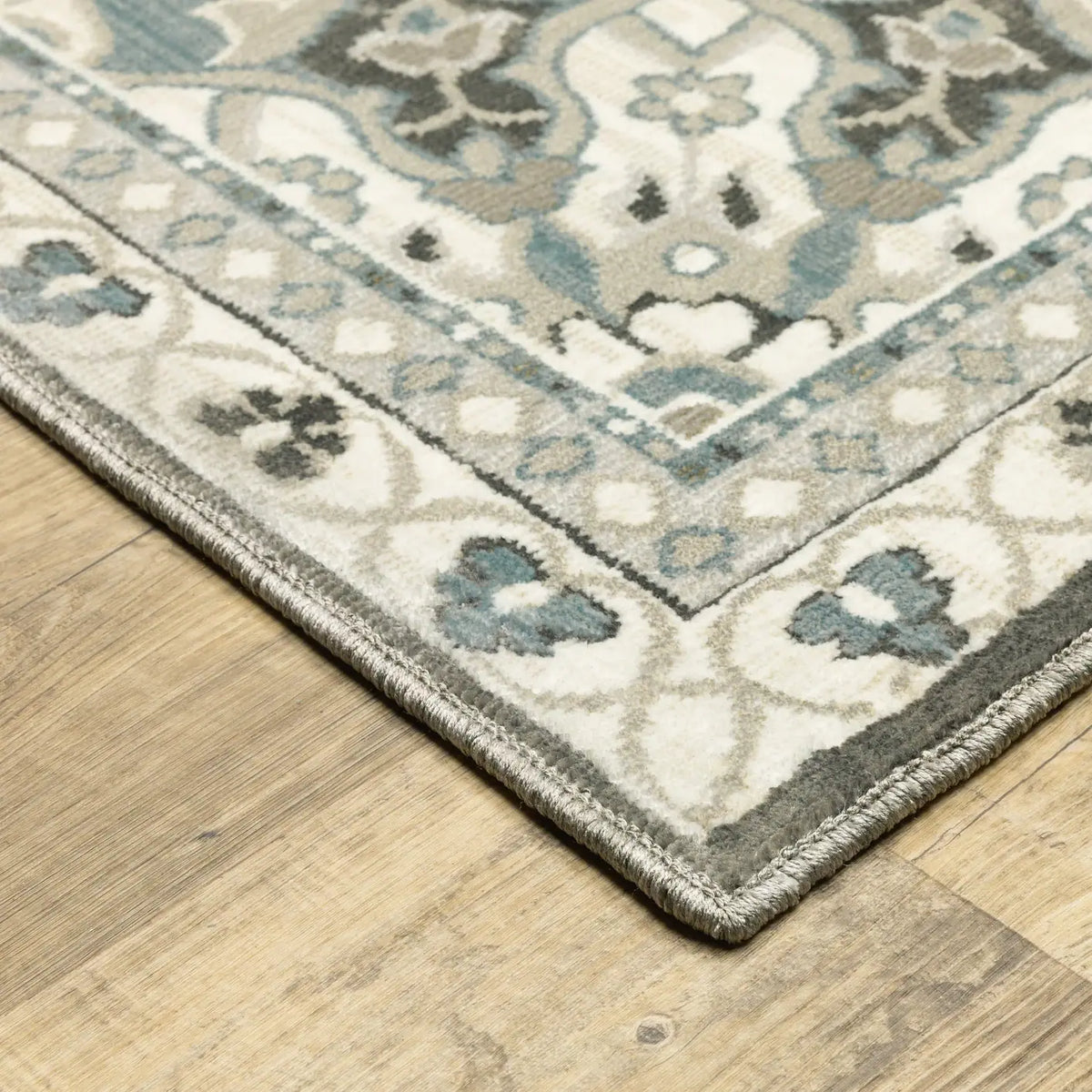 Oriental Weavers Sphinx Ellington Ell01 Ivory/ Blue Rug - corner detail