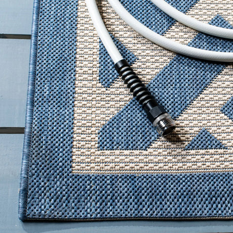 Safavieh Courtyard 6'-7" x 9'-6" Rug in Blue / Light Beige