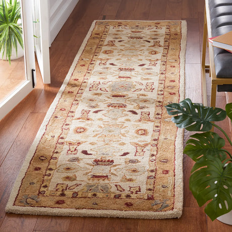 Safavieh Anatolia 2'-3" x 10'-0" Rug in Ivory / Gold