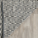 Safavieh Montauk 5'-0" x 7'-0" Rug in Ivory / Dark Grey
