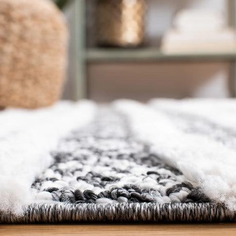 Safavieh Moroccan Tassel Shag 4'-0" x 6'-0" Rug in Black / Ivory