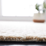 Safavieh Micro-Loop 4'-0" x 6'-0" Rug in Beige / Ivory