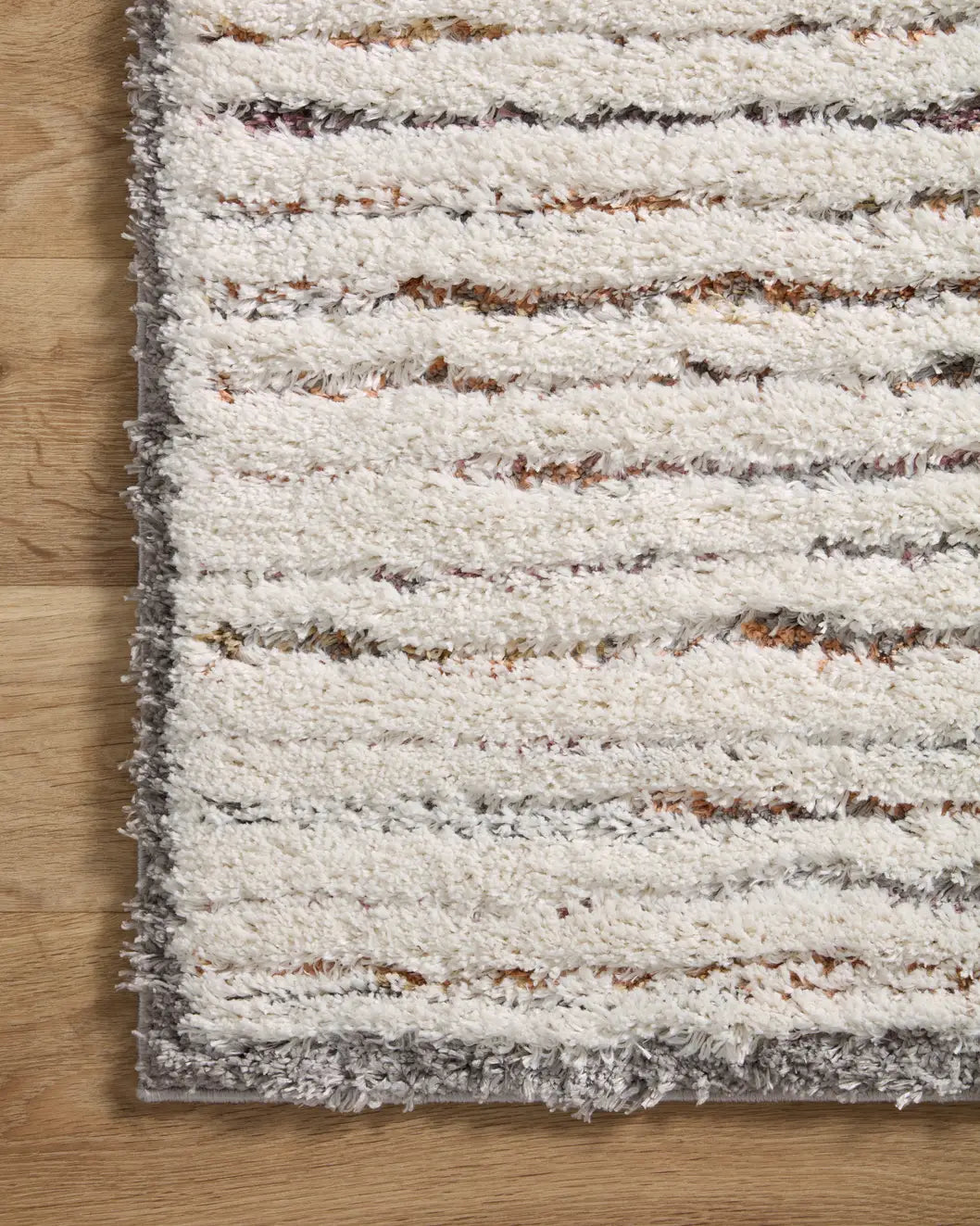 Loloi Levitt Shag Lev-01 Ivory/Multi Rug - corner on wood