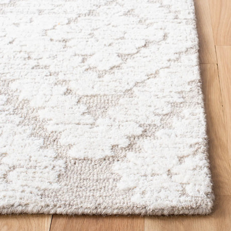 Safavieh Micro-Loop 4'-0" x 6'-0" Rug in Beige / Brown