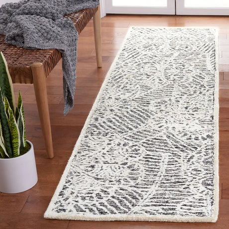 Safavieh Precious 2'-3" x 8'-0" Rug in Black / Ivory