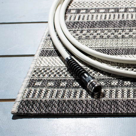 Safavieh Courtyard 4'-0" x 5'-7" Rug in Black / Grey