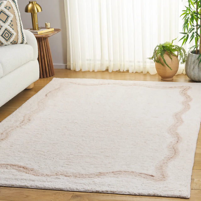 Safavieh Casablanca 4'-0" x 6'-0" Rug in Beige / Ivory