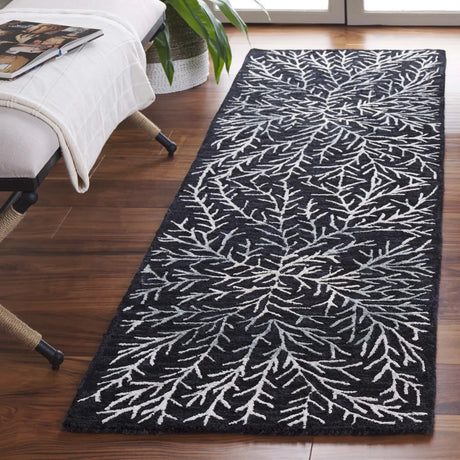 Safavieh Soho 2'-3" x 8'-0" Rug in Black / Ivory
