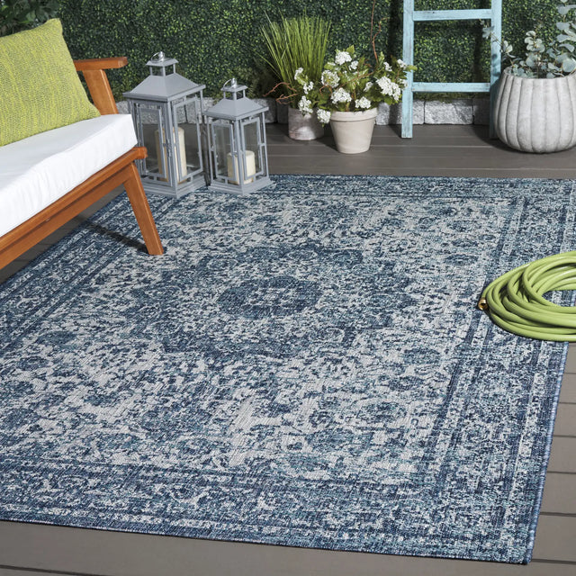 Safavieh Courtyard 5'-3" x 7'-7" Rug in Navy / Grey