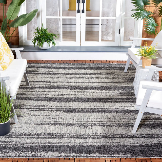 Safavieh Courtyard 6'-7" x 9'-6" Rug in Grey / Black