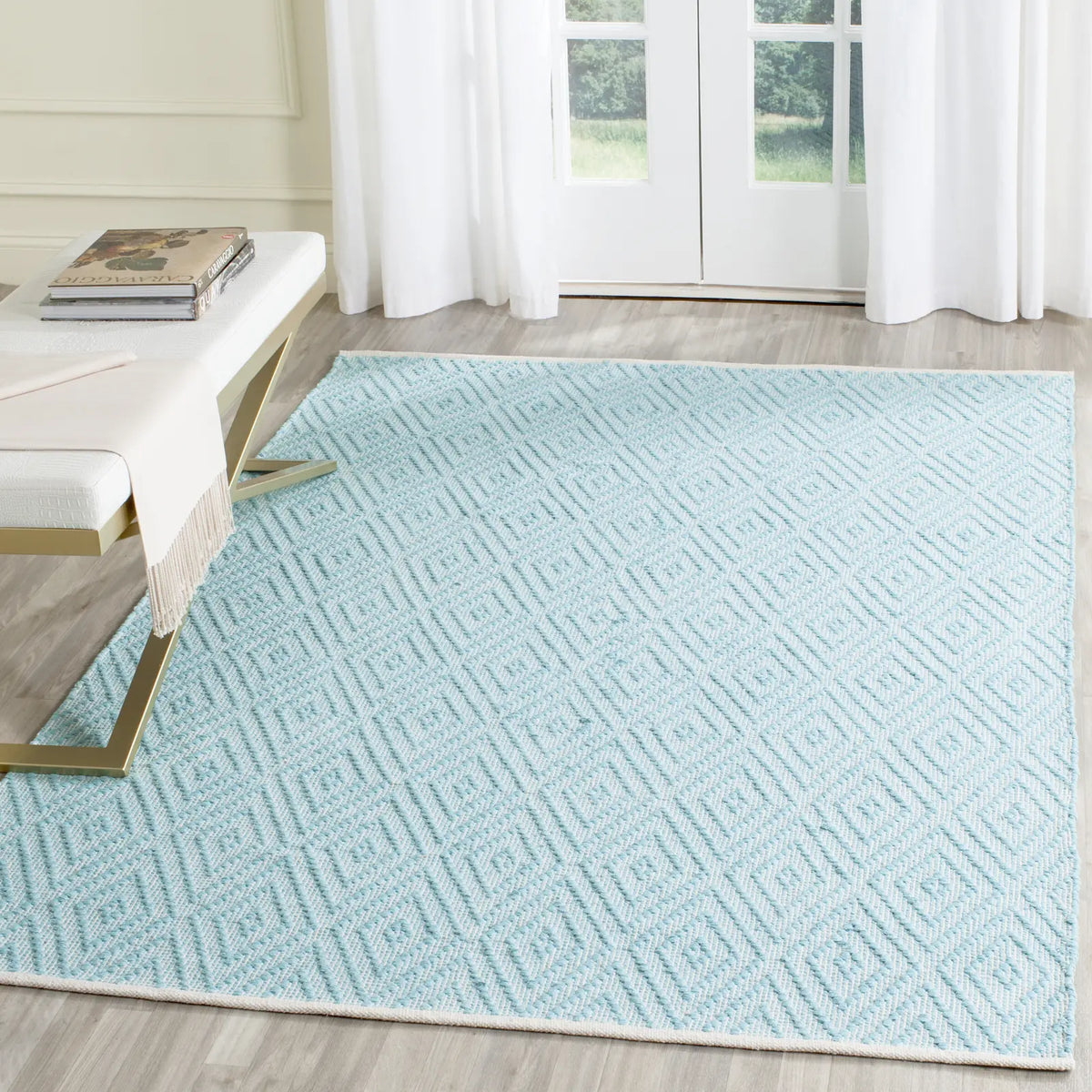 Safavieh Montauk 5'-0" x 7'-0" Rug in Turquoise / Ivory