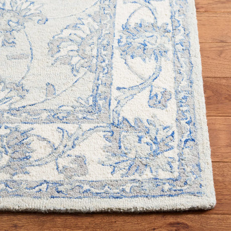 Safavieh Micro-Loop 5'-0" x 8'-0" Rug in Light Blue / Ivory